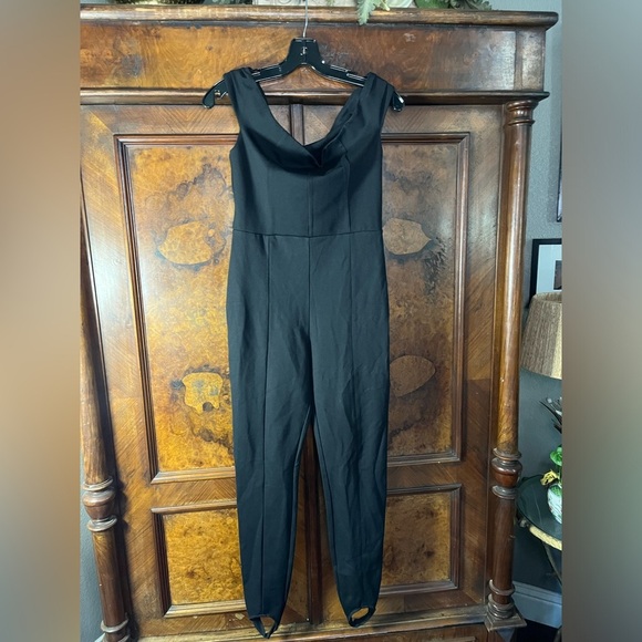 EUC Reformation- Off the Shoulder Stretchy Jumpsuit with Stirrups. Size M. - Picture 1 of 8